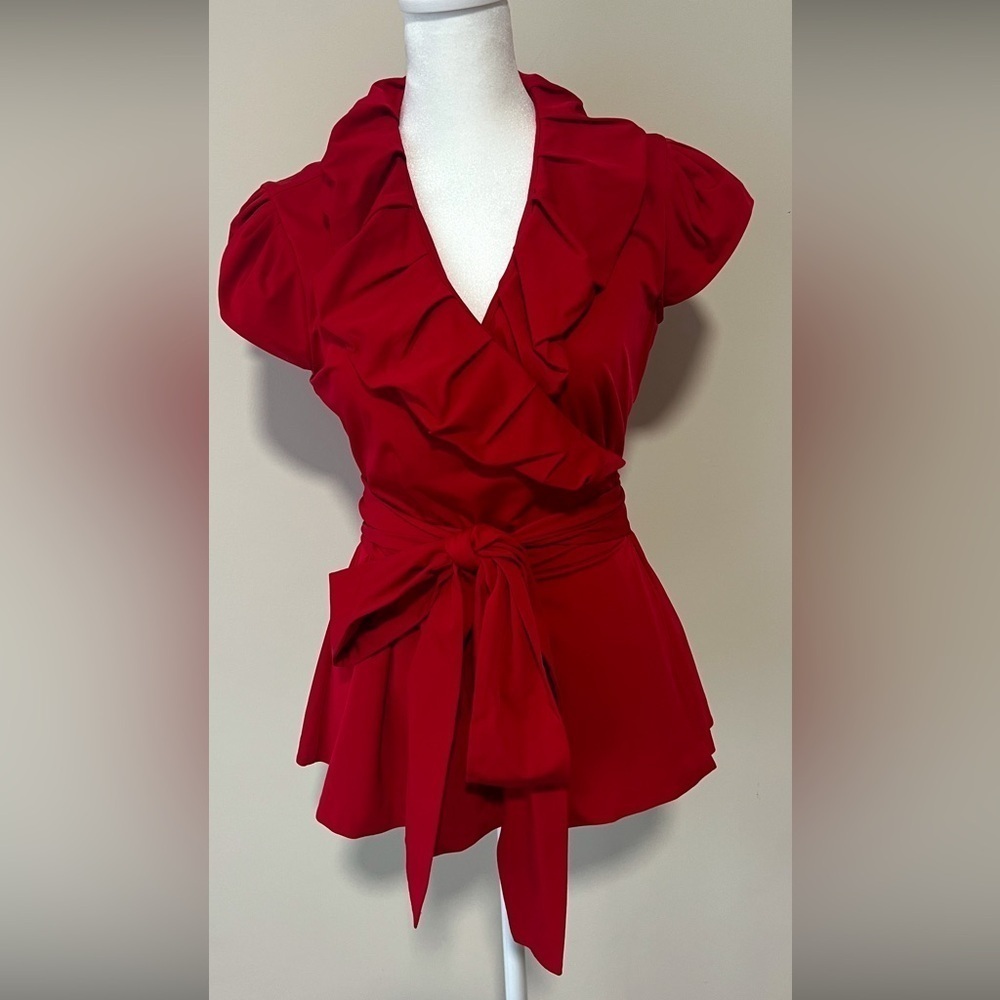 Diane Von Furstenberg Peplum Wrap Top. Pristine Condition. Size 4.